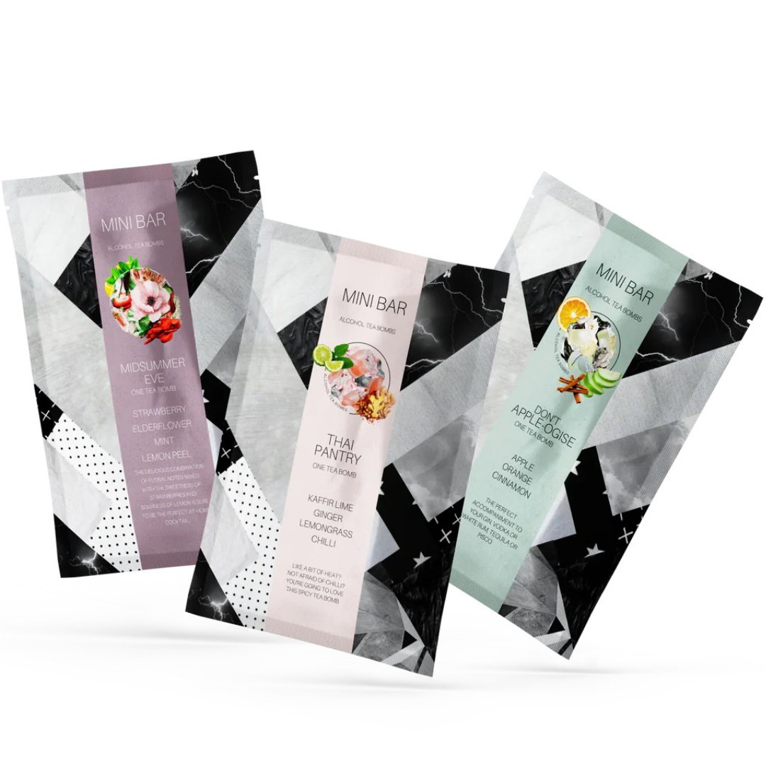 This set includes three rectangular cocktail sachets, each displaying captivating designs of modern geometric patterns. Named "Midsummer Eve," "Thai Pantry," and "Cafè Appleseed," they contain ingredients such as strawberry, elderflower, kaffir lime, and apple—offering an enchanting blend similar to Flowers on Norton St's Alcohol Tea-Bombs.