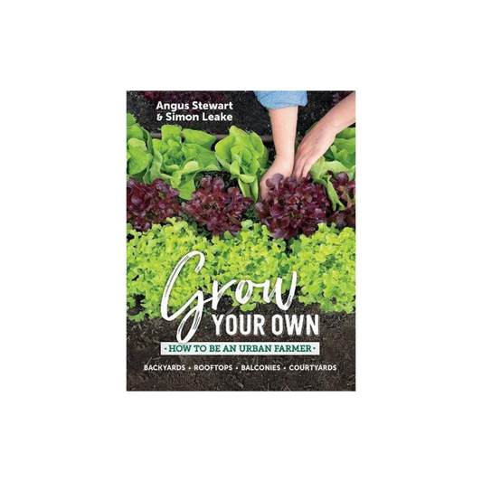 The cover of the book "Grow Your Own," published by Flowers on Norton St, showcases hands harvesting leafy greens such as lettuce. The subtitle, "How to Be an Urban Farmer," accompanies text about urban gardening and tips on growing your own food in backyards, rooftops, balconies, and courtyards.